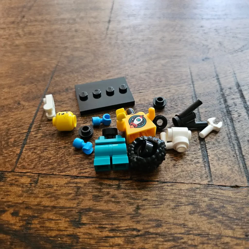 the pieces of the Astronomer Kid of LEGO 71048 Minifigures Series 27 Reviewed by angelofdeathWHV